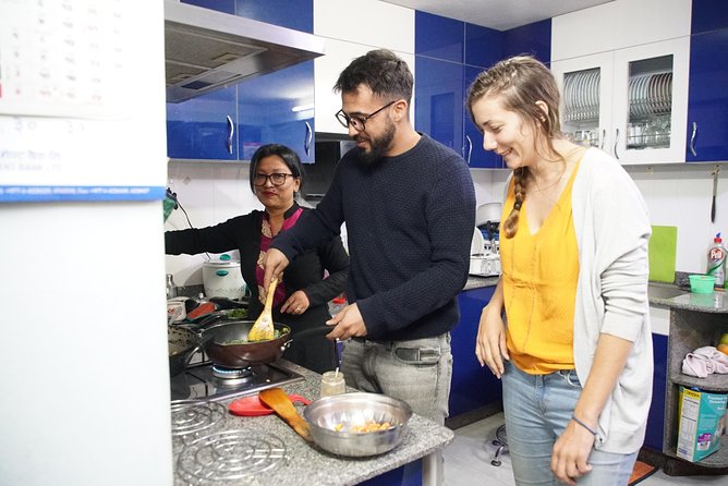 Cook and Dine with a Local family - Choosing spices at a Kathmandu market