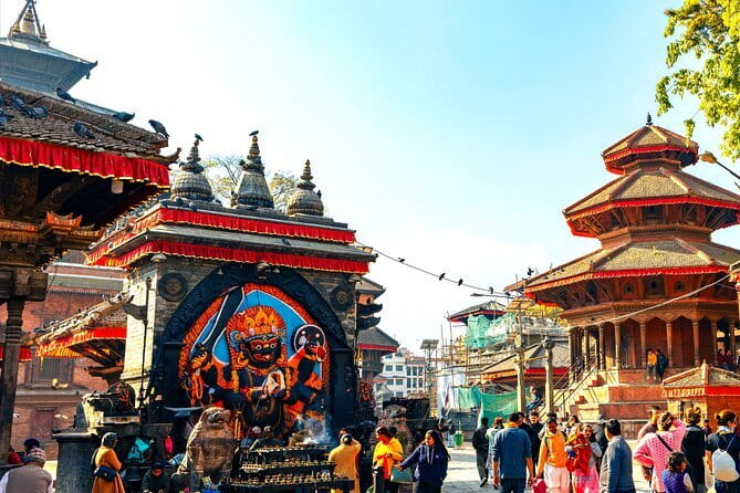 Kathmandu Bhaktapur Patan Authentic Local Tour +7 UNESCO WH Sites - Day three: Kathmandu markets, hilltop worship, and major stupas