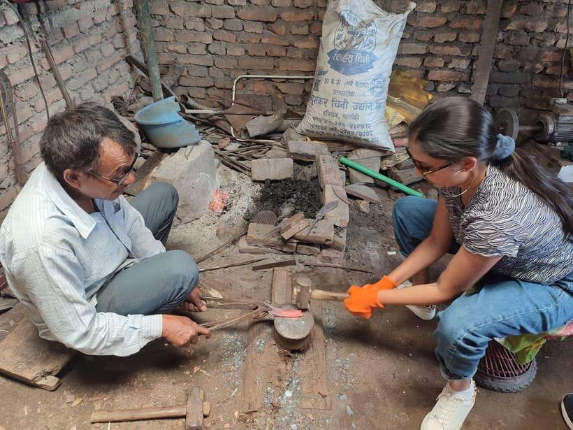 Knife Khukuri Making Workshop - Hammering the iron into a blade