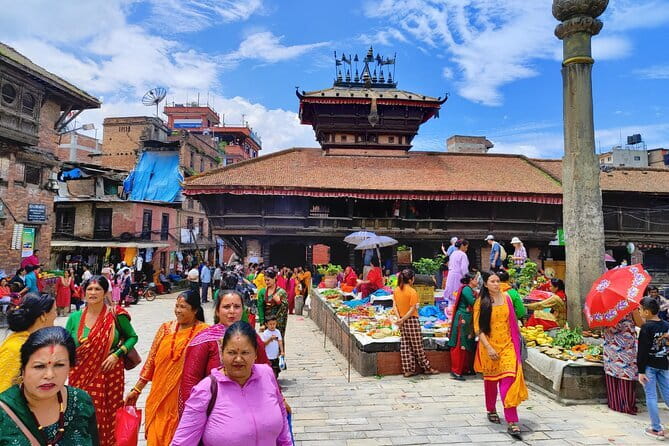 Private Full-Day Kathmandu All 7 UNESCO World Heritage Sites Tour - Boudhanath, walking around the great Buddhist stupa